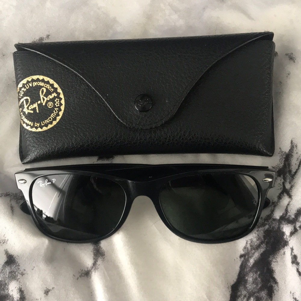 Ray Ban sunglasses with case.